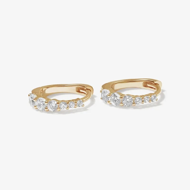 Madeus huggie earrings sold by Adornmonde