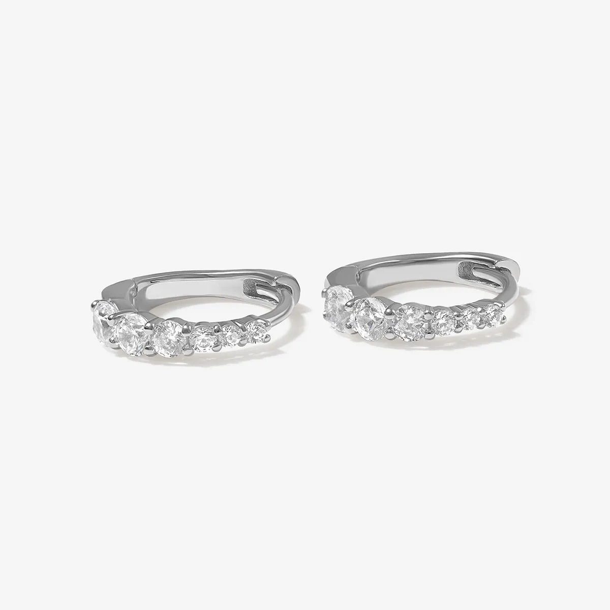 Madeus huggie earrings sold by Adornmonde