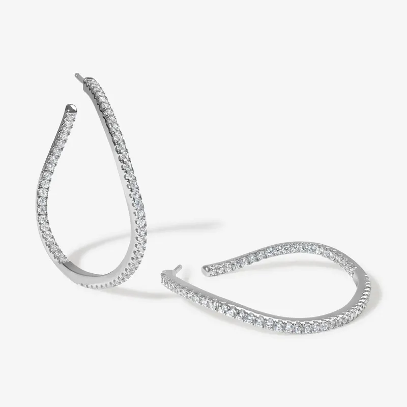 Tao wave maxi hoop earrings sold by Adornmonde