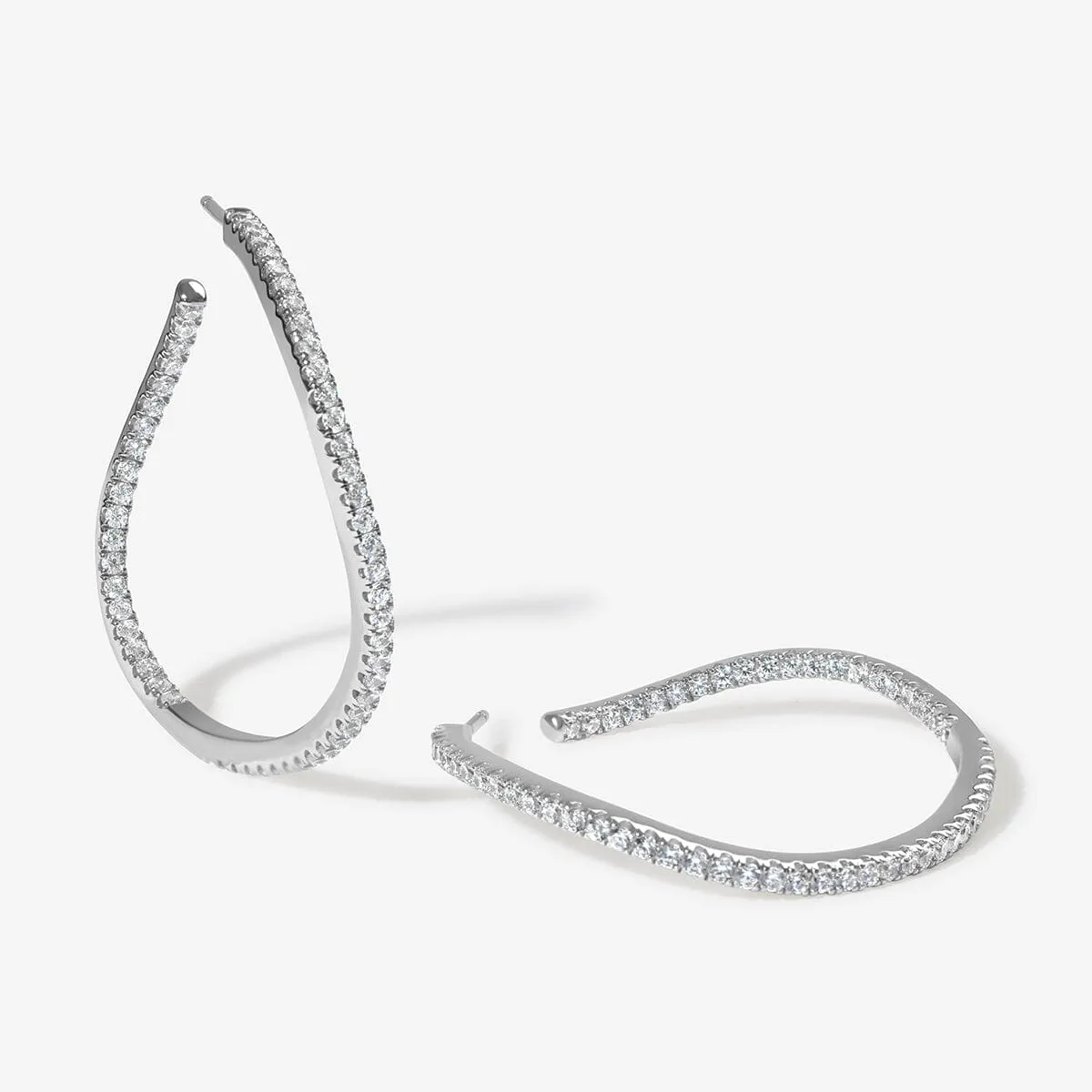 Tao wave maxi hoop earrings sold by Adornmonde
