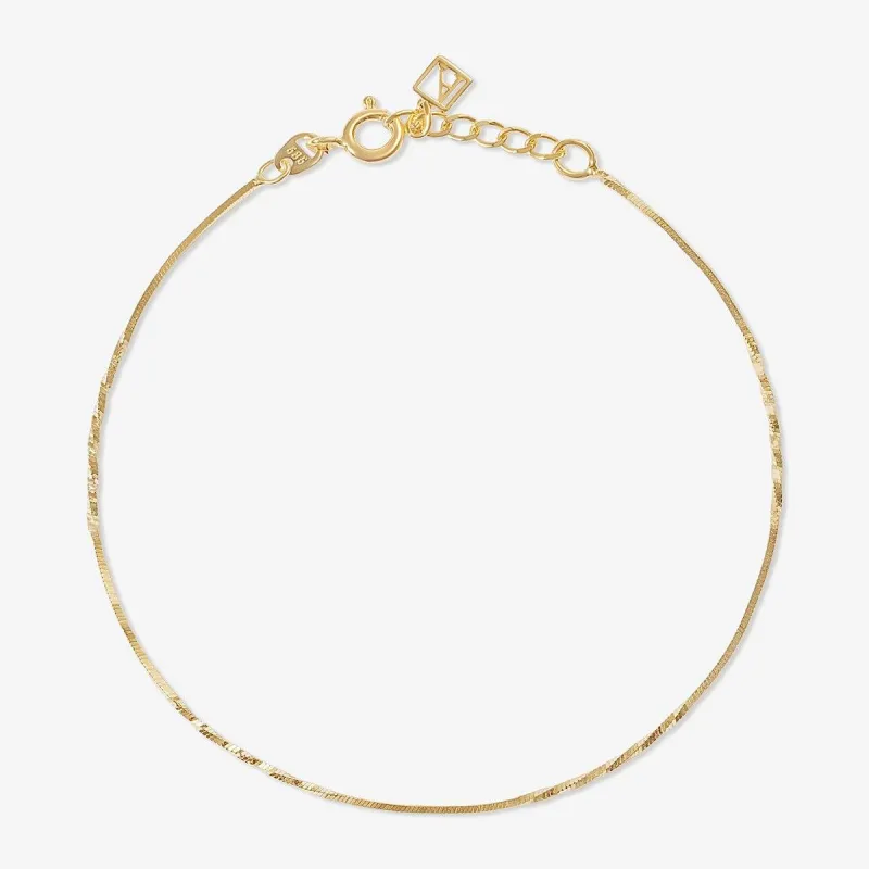 Christian twisted snake chain bracelet sold by Adornmonde