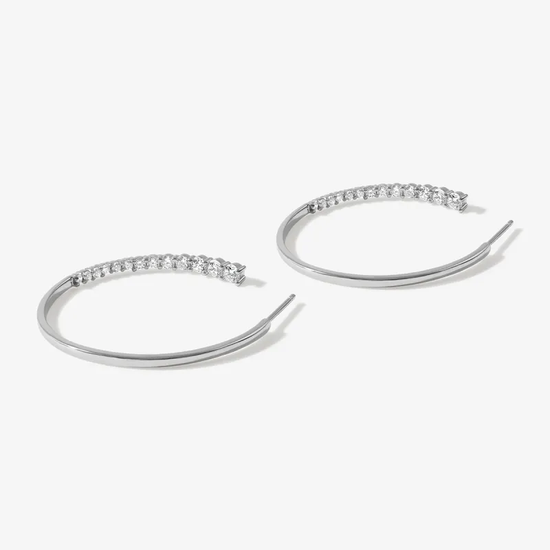 Tyler maxi hoop earrings sold by Adornmonde