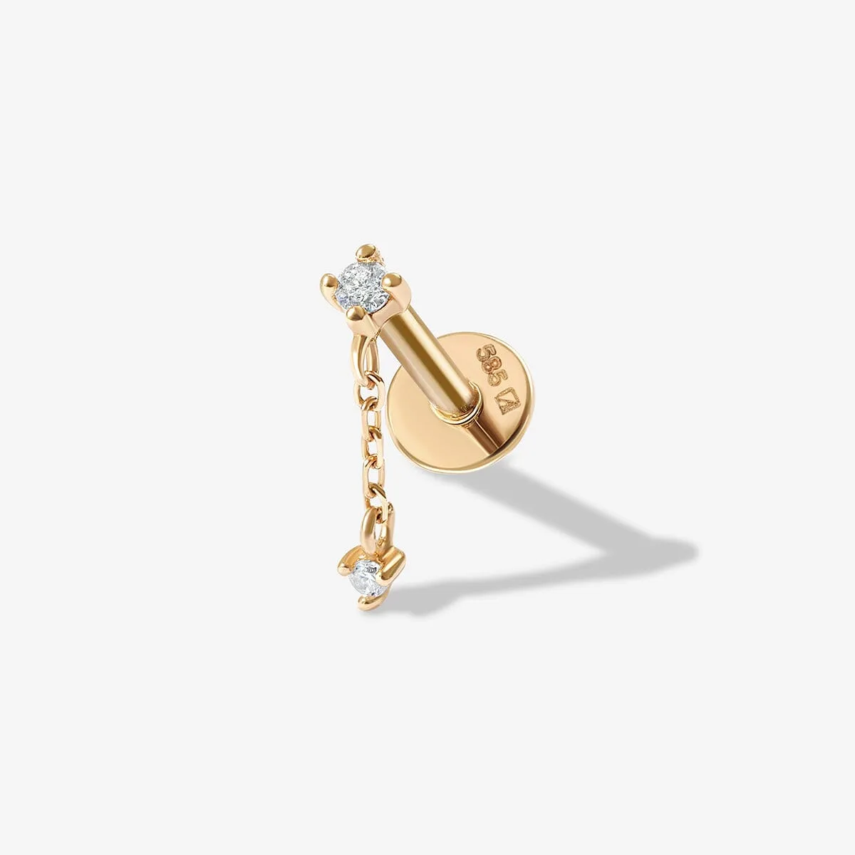 Haluk diamond stud piercing sold by Adornmonde