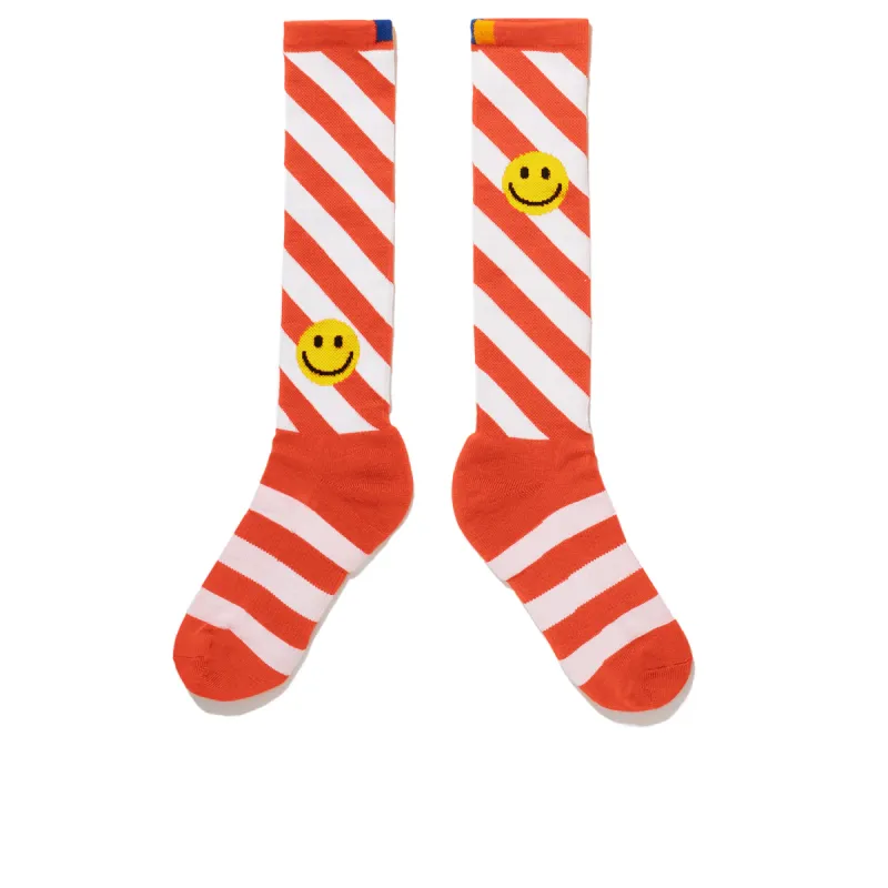 The Women's Diagonal Smile Stripe Knee High - Poppy/White sold by Kule