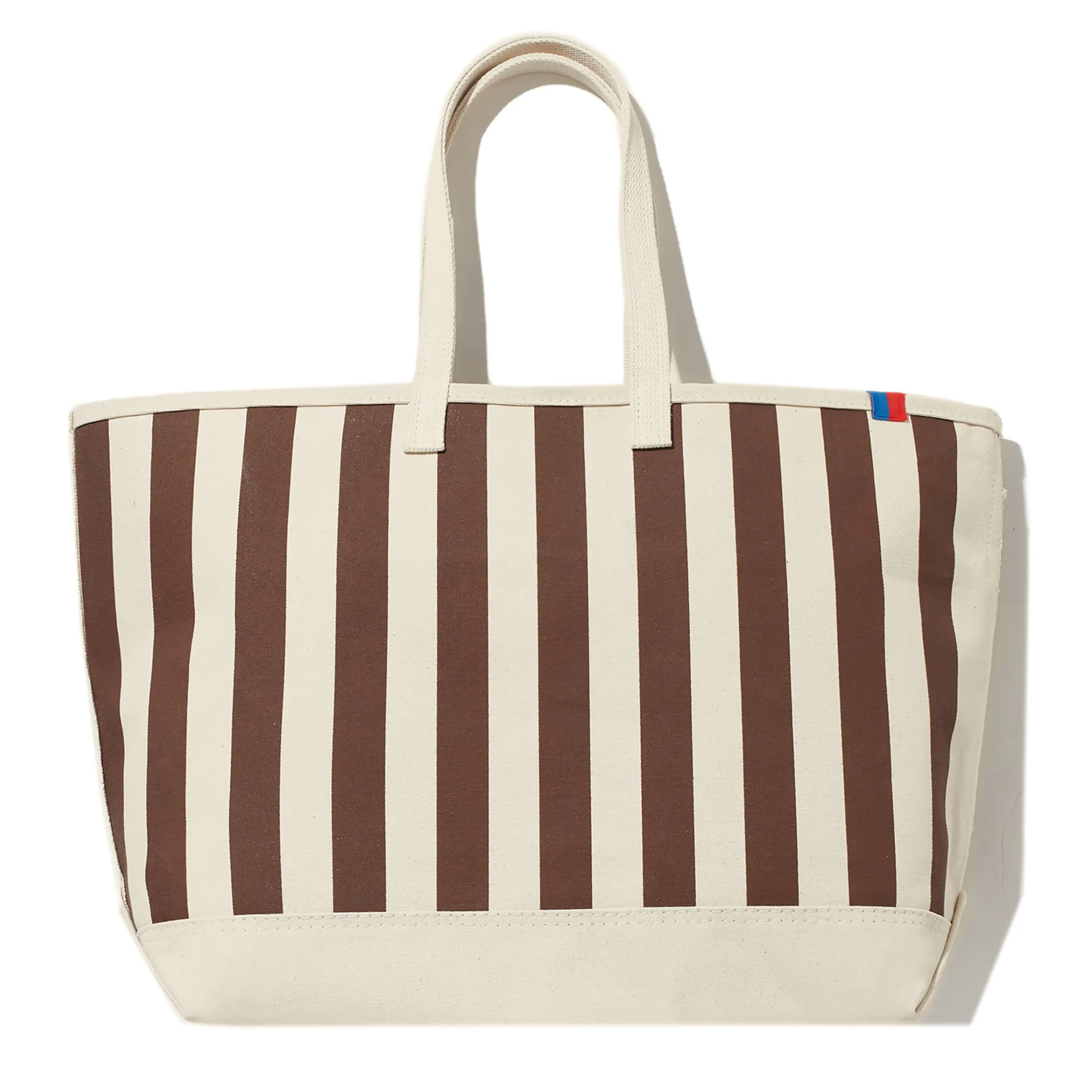 The Over the Shoulder All Over Striped Tote - Canvas/Walnut sold by Kule
