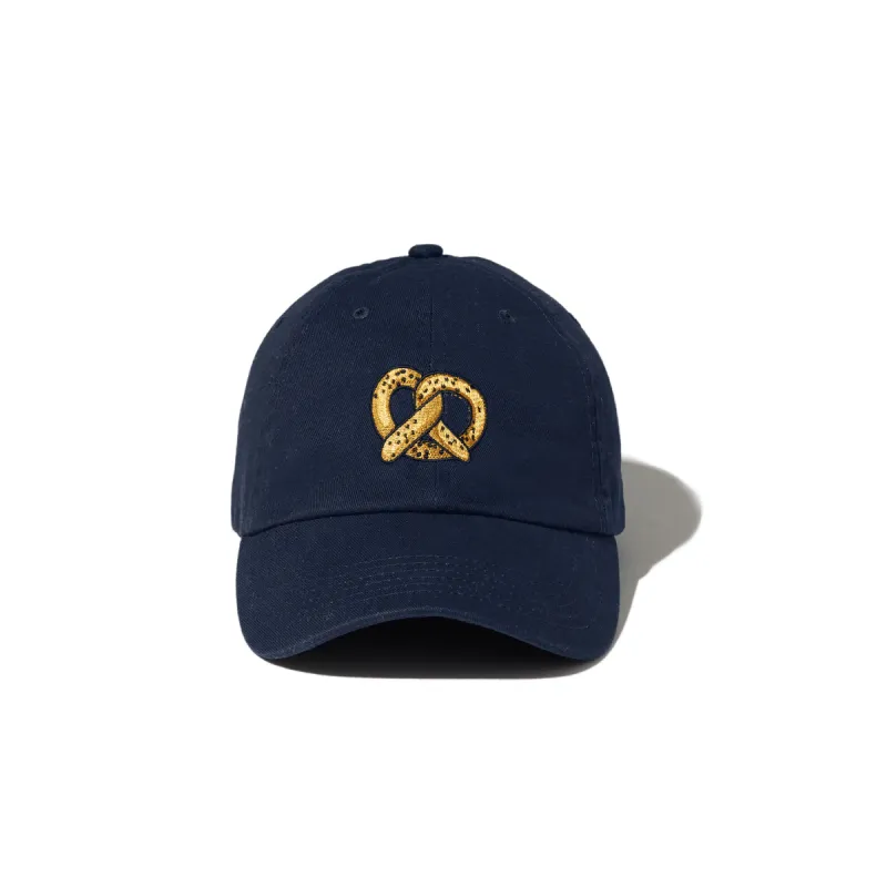 The Pretzel Kap - Navy sold by Kule