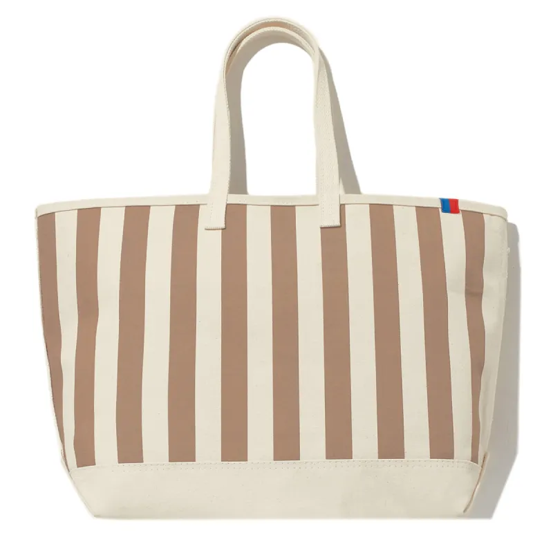 The Over the Shoulder All Over Striped Tote - Canvas/Sand sold by Kule