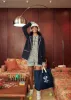 The Over the Shoulder Tennis Tote - Navy sold by Kule