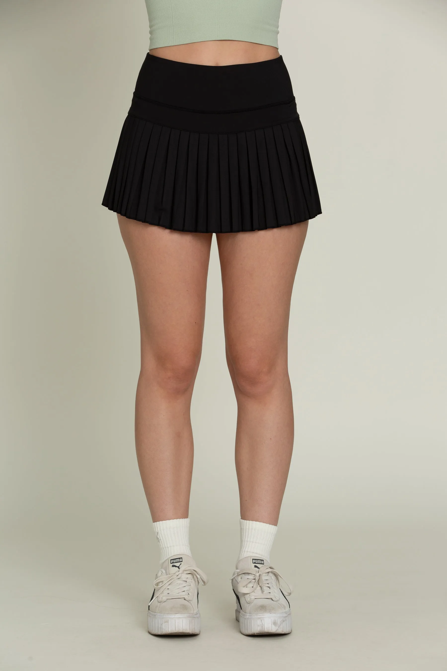 Black Pleated Tennis Skirt sold by Gold Hinge