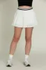 Ivory Striped Tennis Skirt sold by Gold Hinge