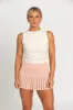 Peach Pleated Tennis Skirt sold by Gold Hinge