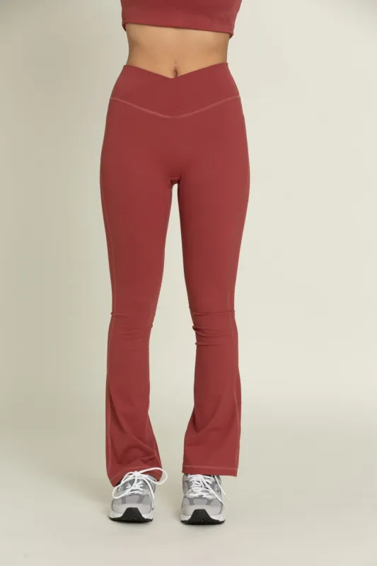 Pale Red Flare Yoga Pants sold by Gold Hinge