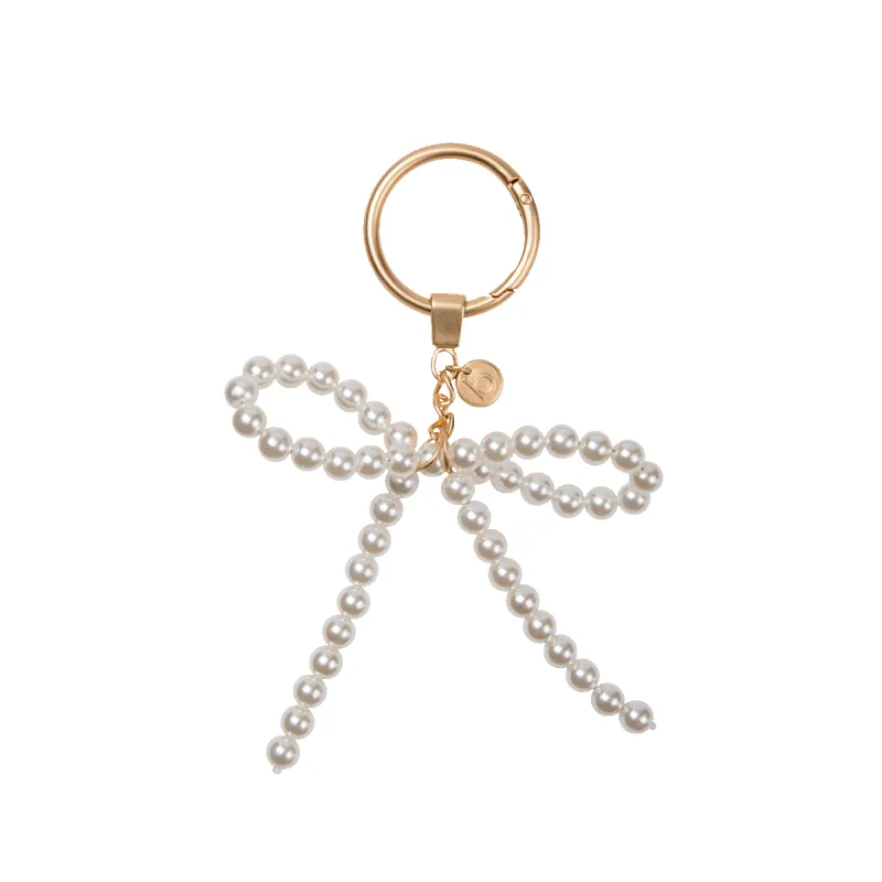 Bogg'd & Charmed  - White Pearl Bow sold by Bogg Bag