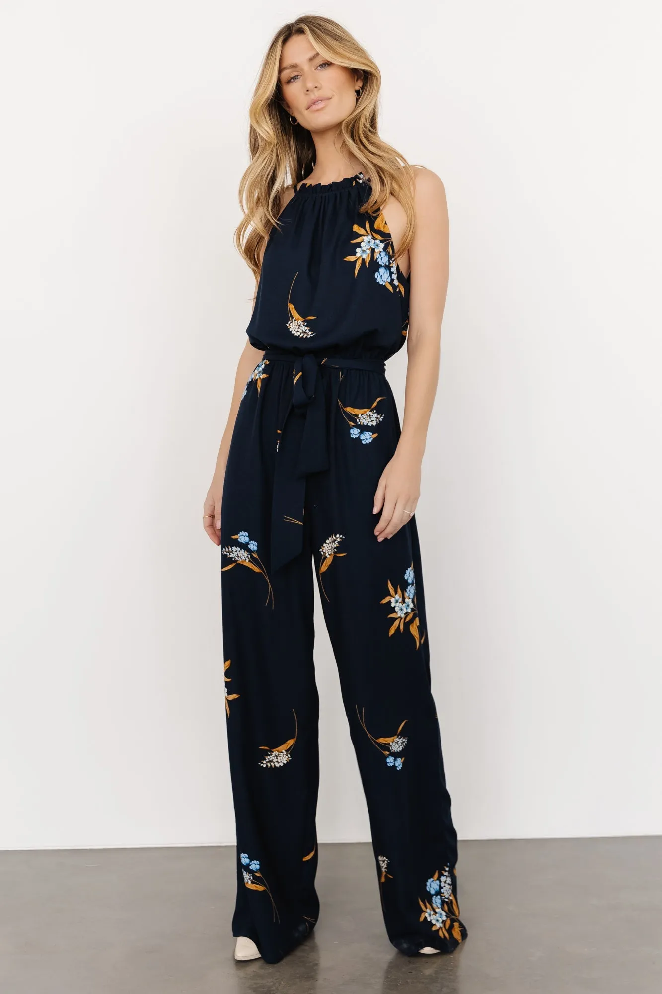 Alameda Halter Jumpsuit | Navy Blue Floral sold by Baltic Born
