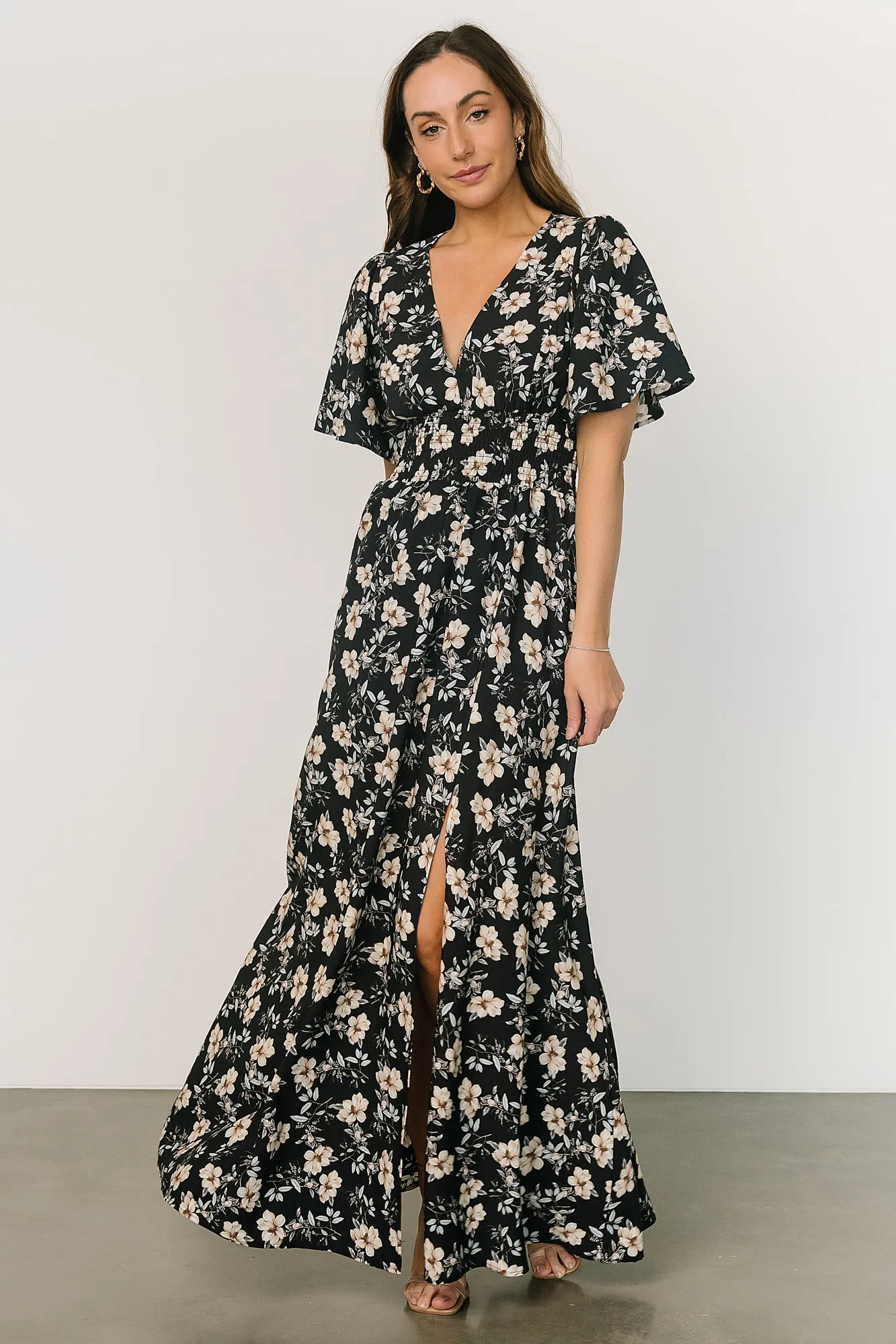 Verona Smocked Maxi Dress | Black Floral sold by Baltic Born
