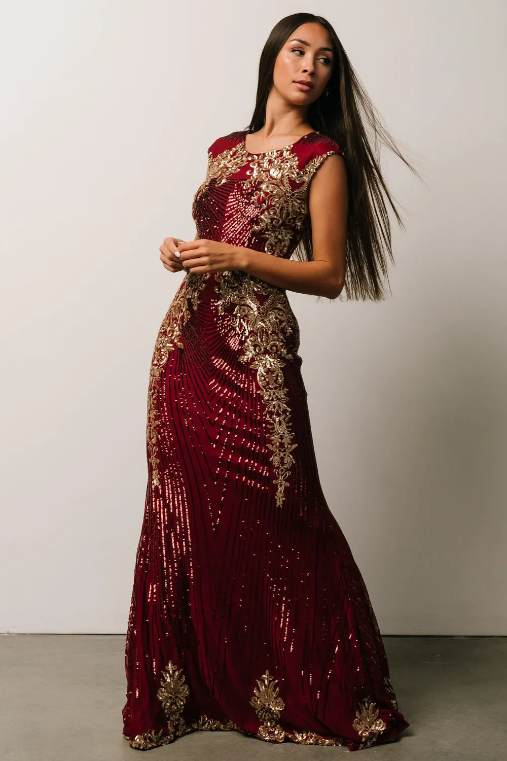 Azura Sequin Gown | Burgundy + Gold sold by Baltic Born