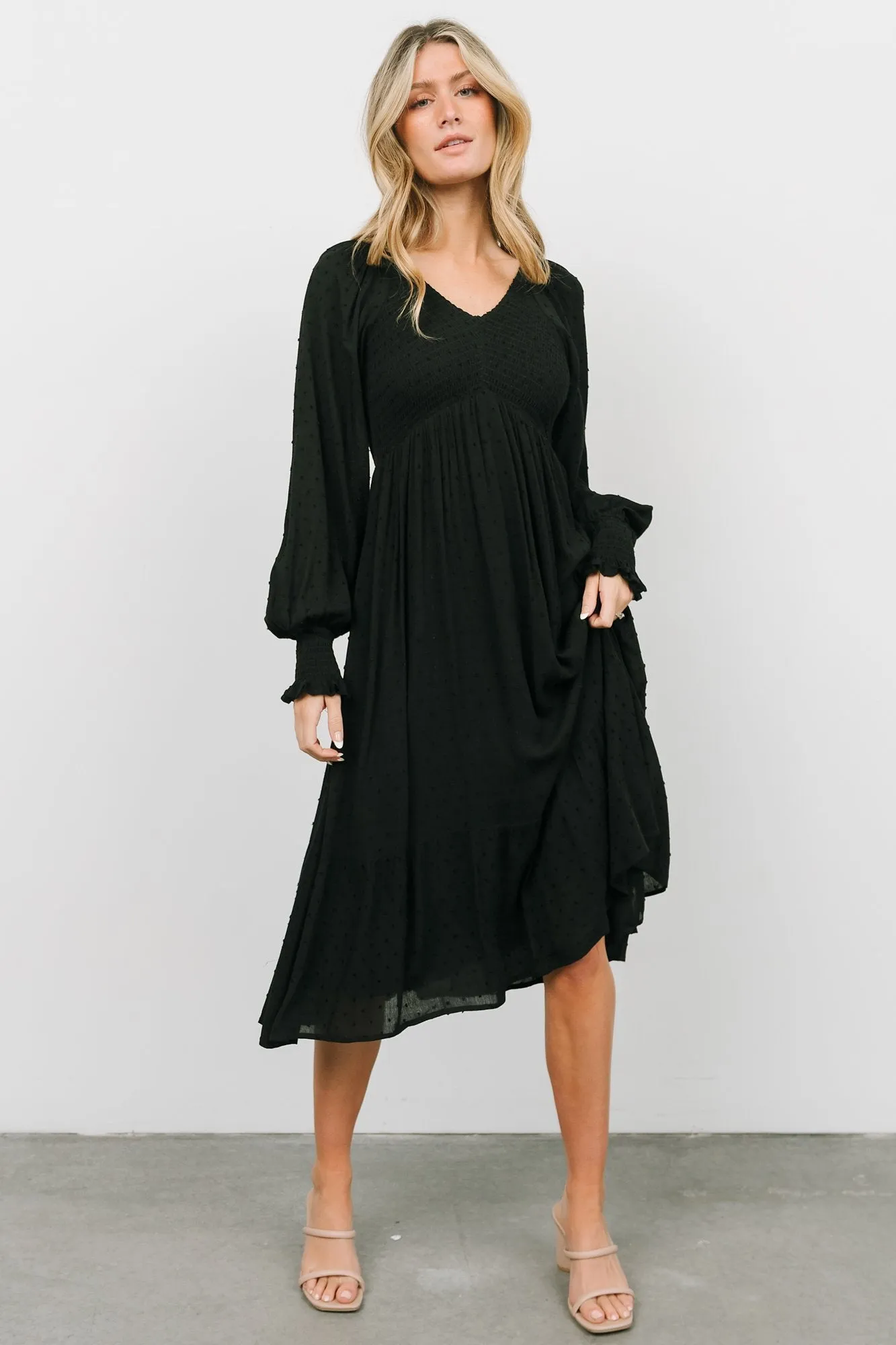 Lainey Smocked Dotted Midi Dress | Black sold by Baltic Born