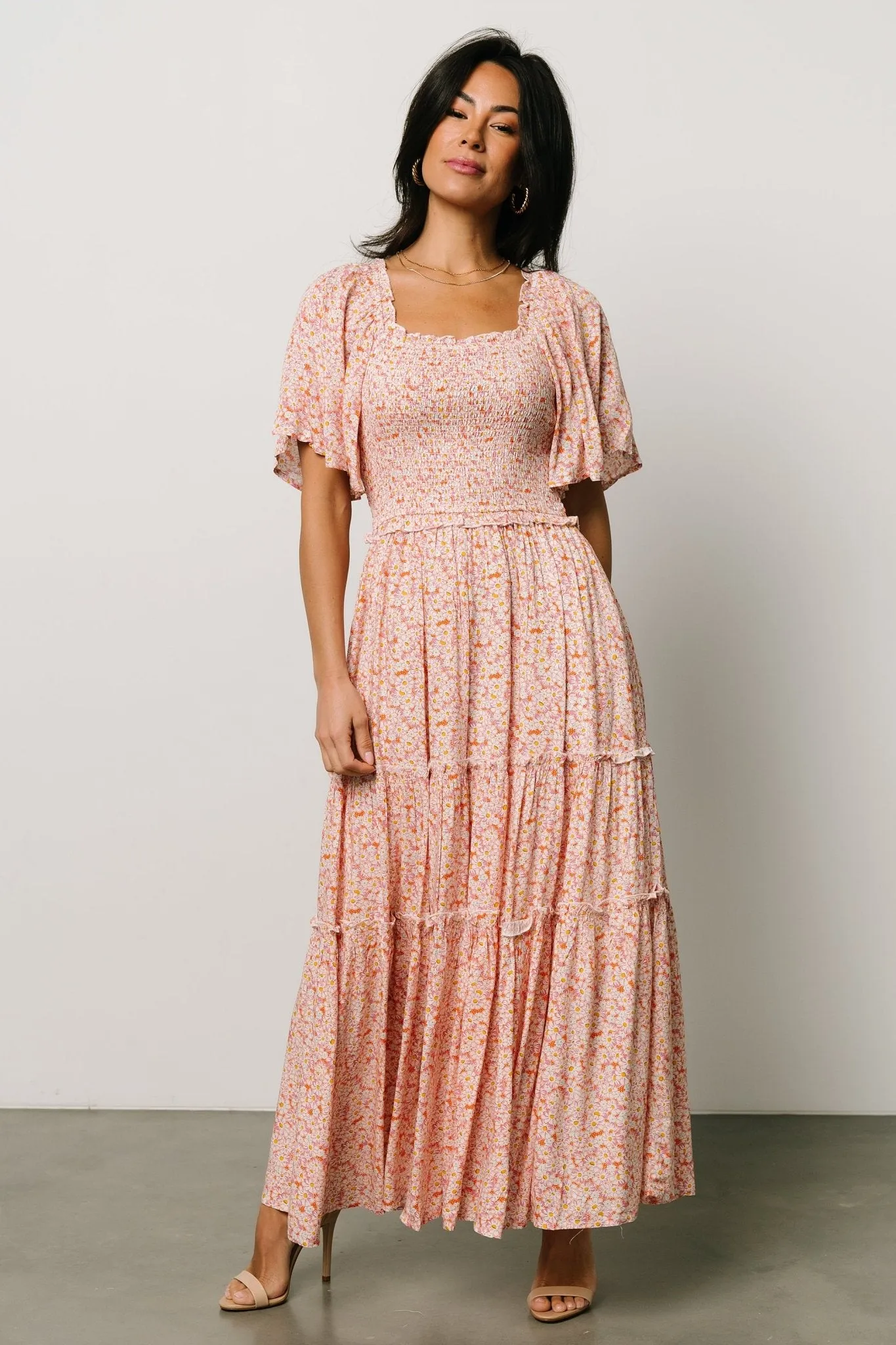 Regina Smocked Maxi Dress | Coral Floral sold by Baltic Born