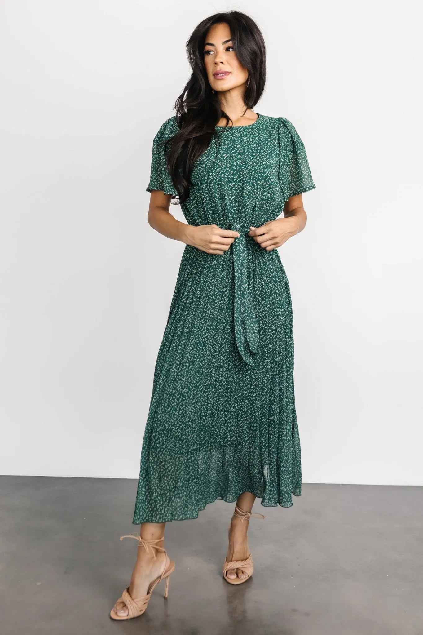 Prim Pleated Dress | Green Print sold by Baltic Born