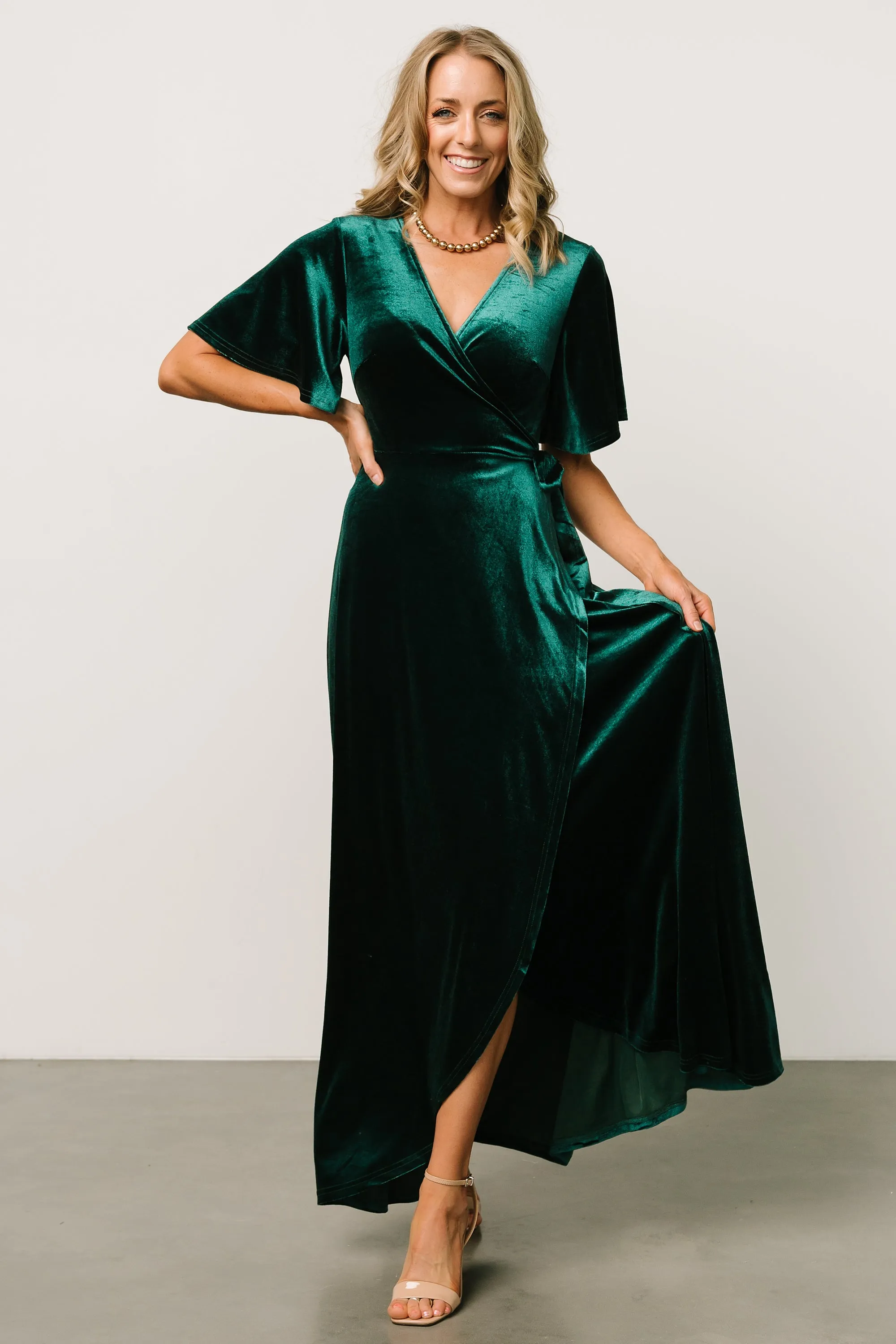 Maella Velvet Wrap Dress | Emerald sold by Baltic Born