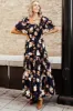 Southampton Smocked Maxi Dress | Navy Multi Floral sold by Baltic Born