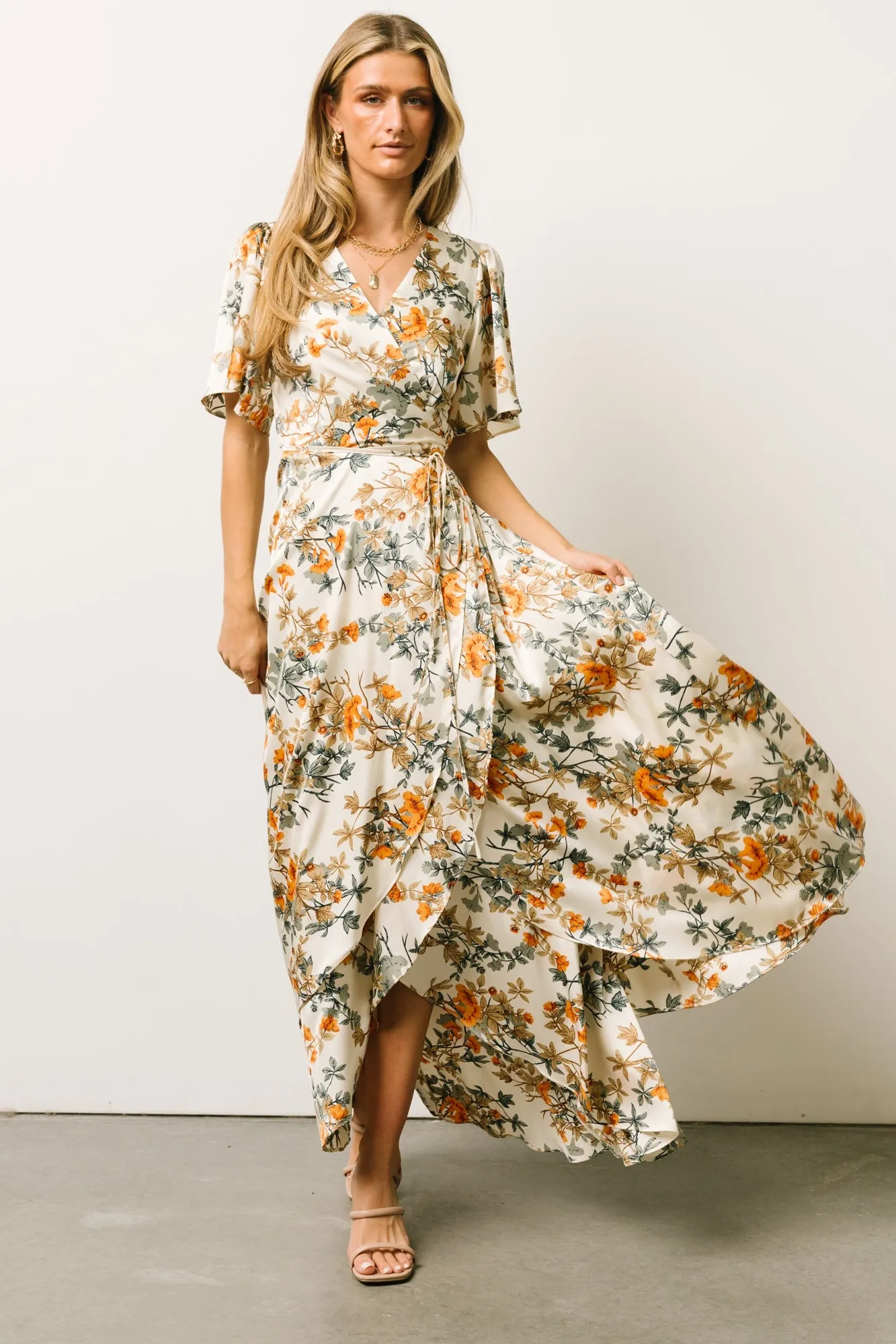 Amara Wrap Dress | Ivory Multi Floral sold by Baltic Born