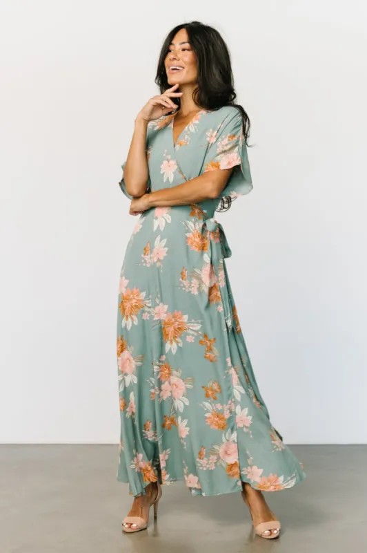 Hailey Wrap Maxi Dress | Seafoam Multi Floral sold by Baltic Born