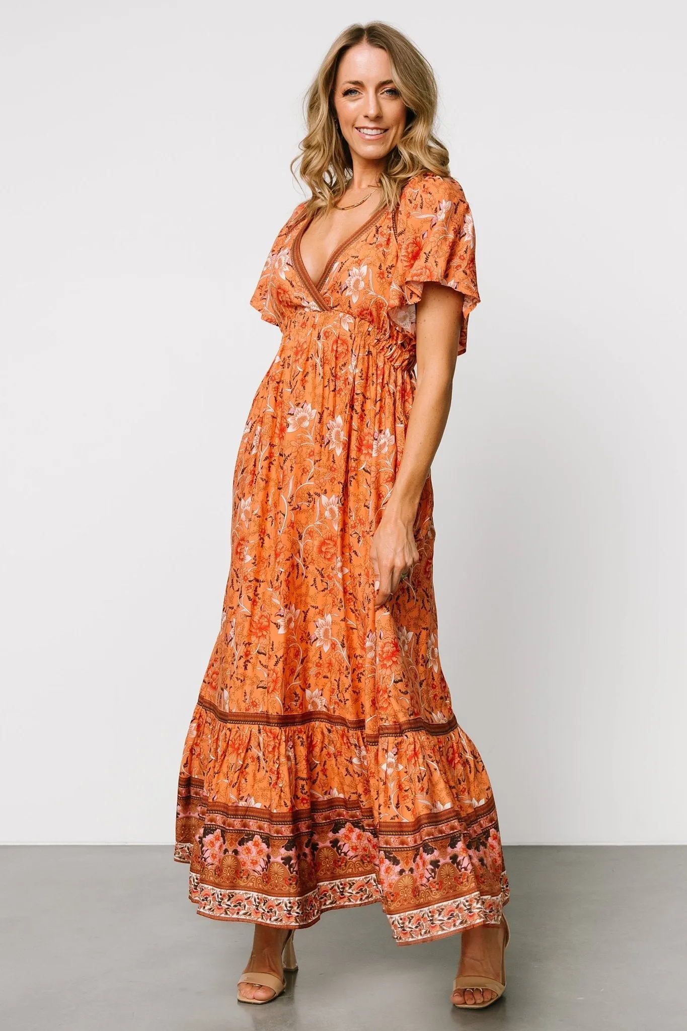 Marietta Maxi Dress | Orange Floral sold by Baltic Born