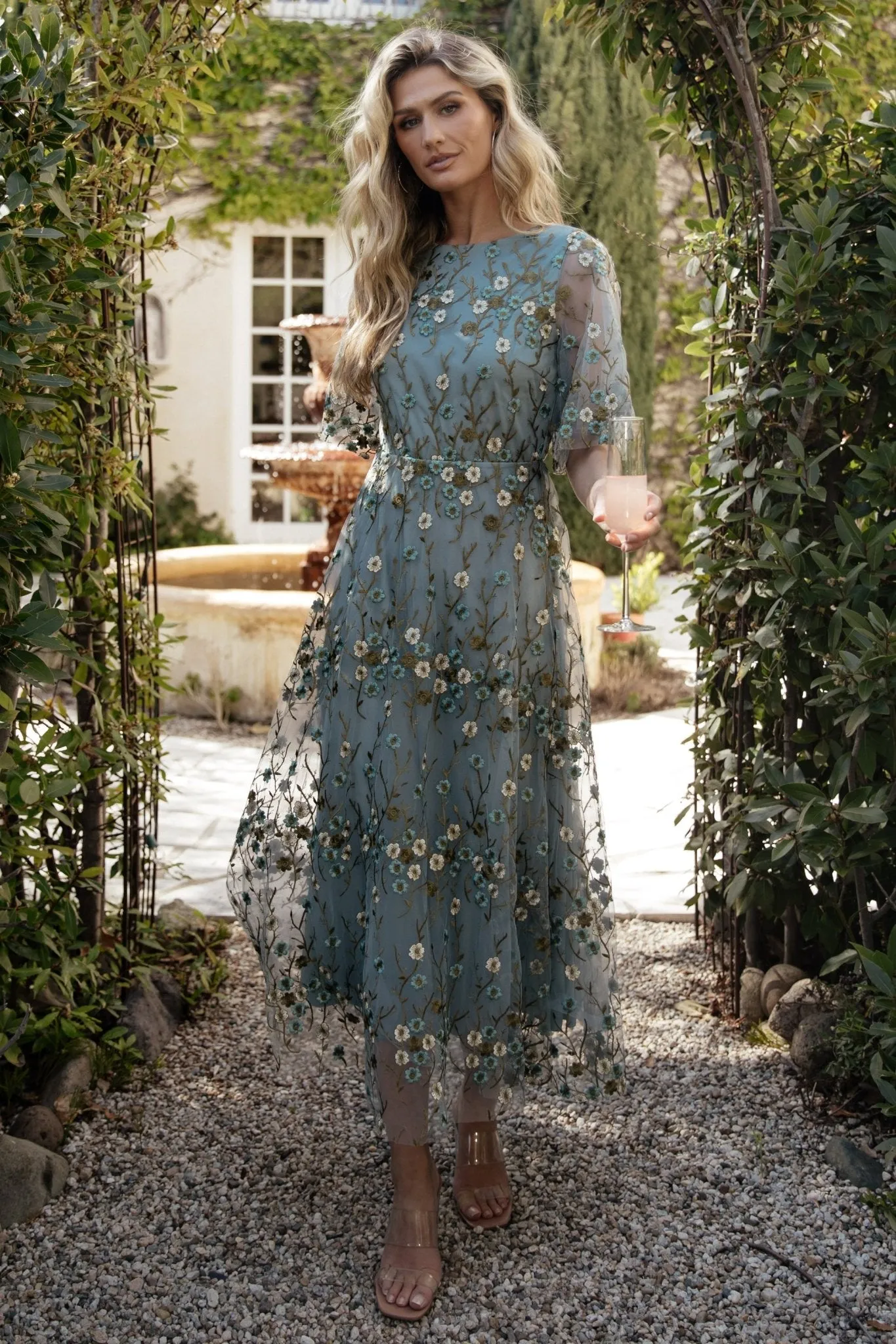 Arabella Embroidered Tulle Maxi Dress | Dusty Blue Floral sold by Baltic Born