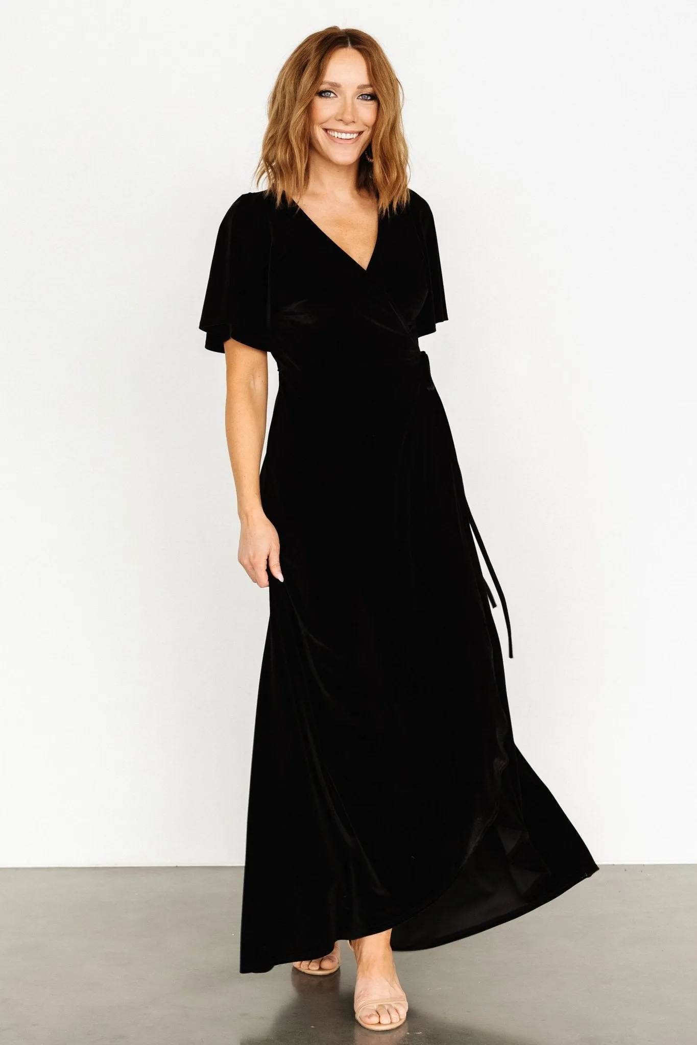 Katelyn Velvet Maxi Wrap Dress | Black sold by Baltic Born