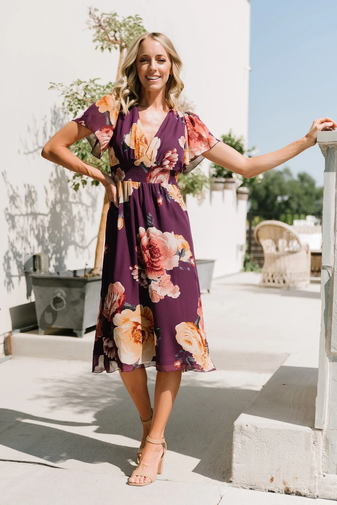 Sarah Smocked Midi Dress | Eggplant Floral sold by Baltic Born