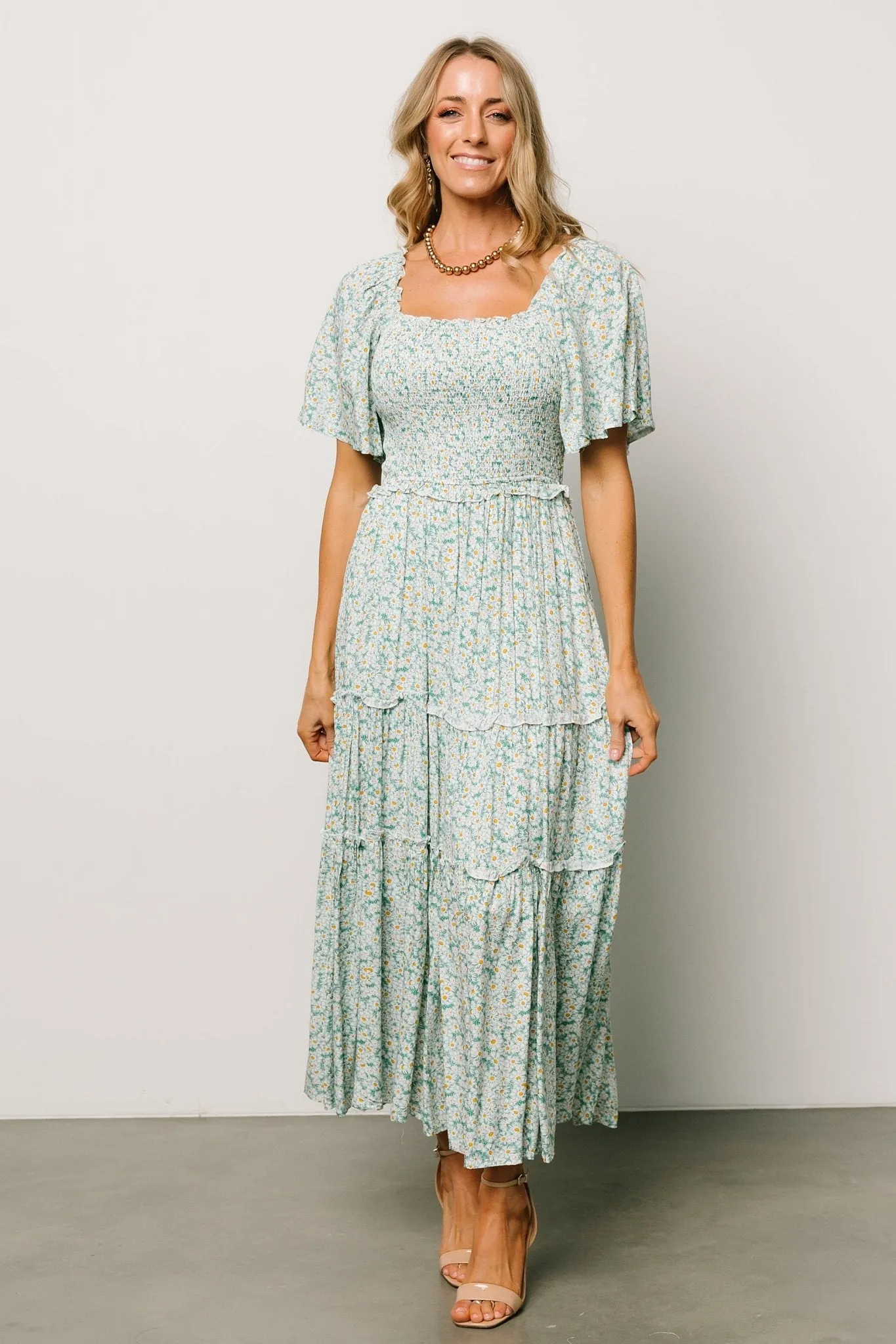 Regina Smocked Maxi Dress | Green Floral sold by Baltic Born