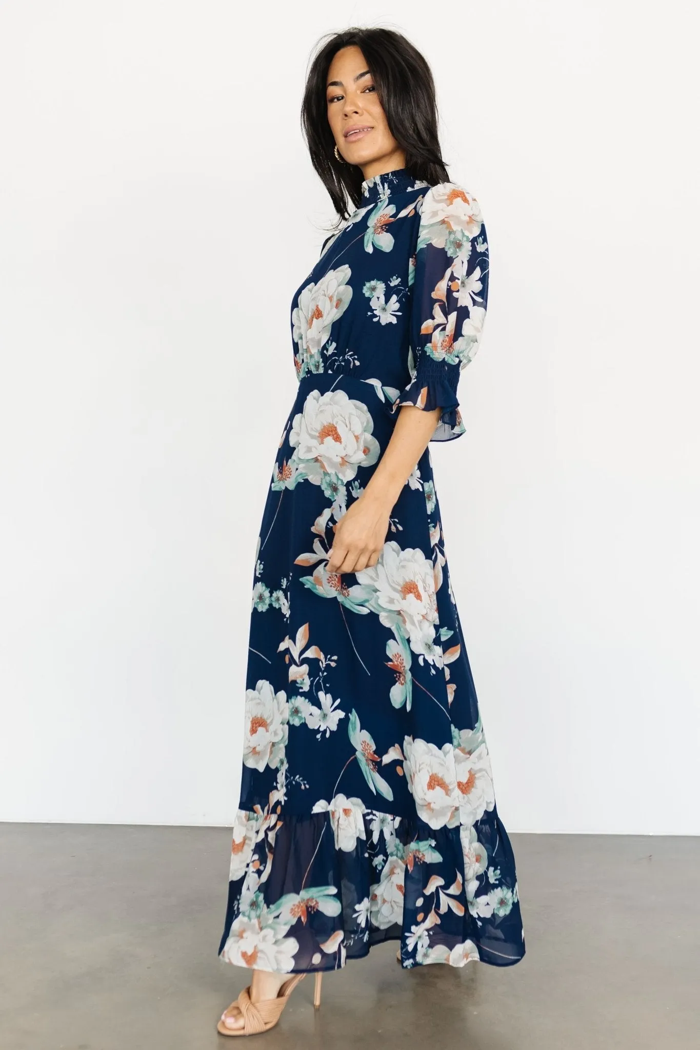 Marie Mock Neck Maxi Dress | Navy Floral sold by Baltic Born