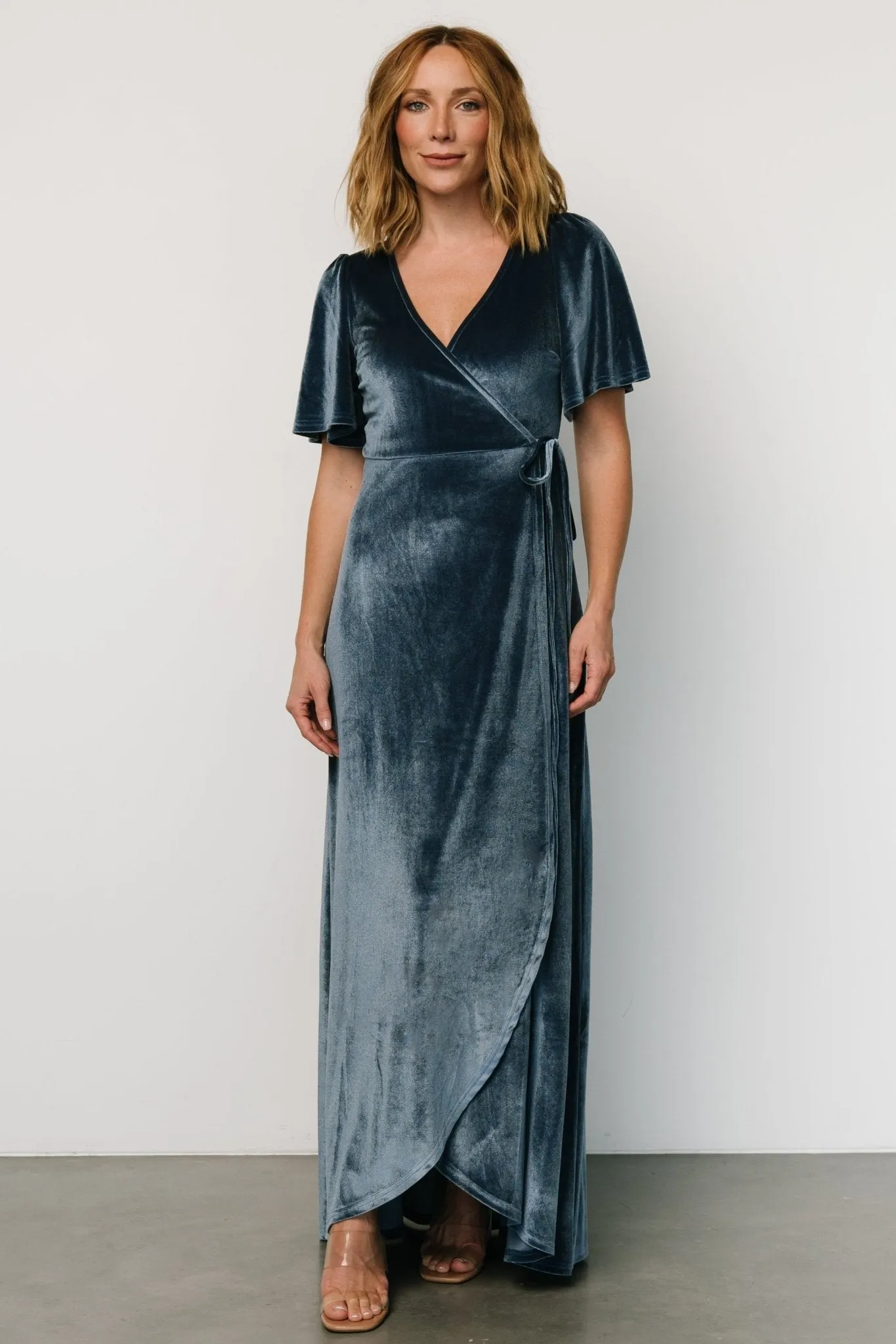 Katelyn Velvet Maxi Wrap Dress | Blue sold by Baltic Born