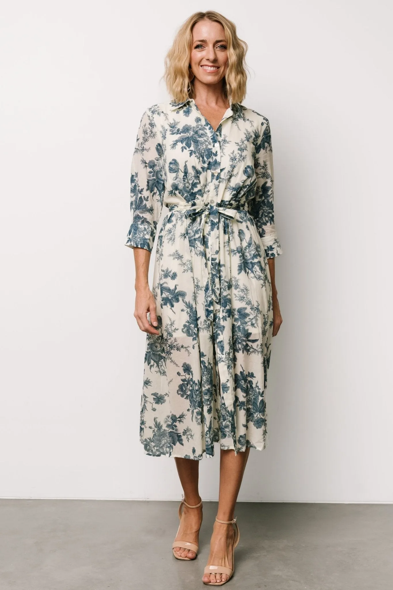 Eunice Button Midi Dress | Ivory + Blue Floral sold by Baltic Born