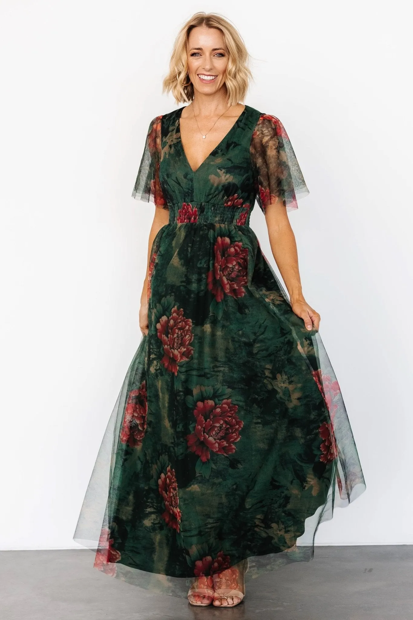 Cressida Tulle Maxi Dress | Dark Green + Red Floral sold by Baltic Born