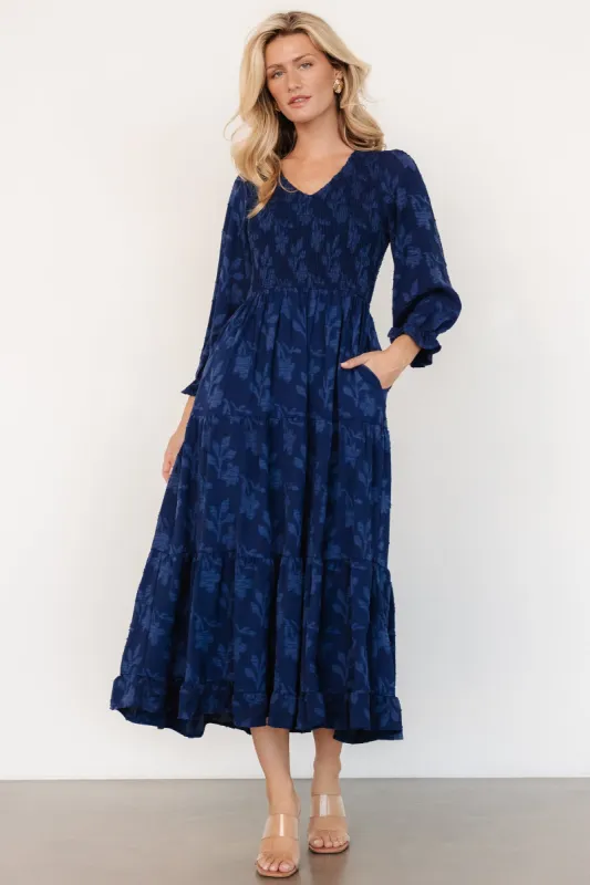 Aubrey Smocked Midi Dress | Navy Floral sold by Baltic Born