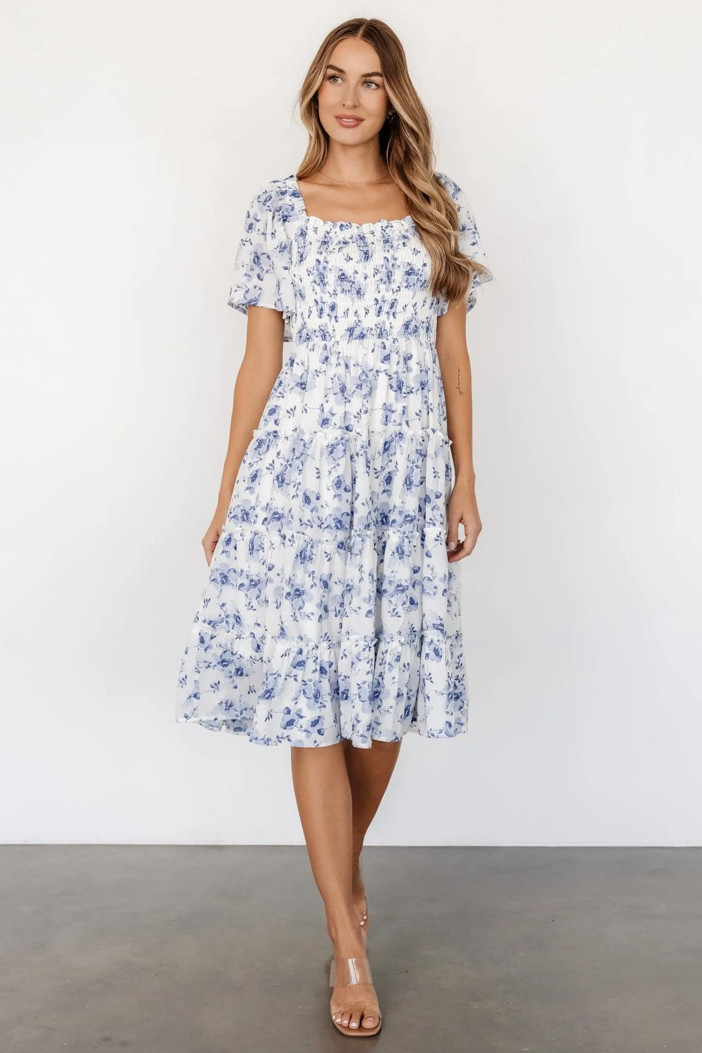 Lilla Tiered Midi Dress | Off-White + Blue Floral sold by Baltic Born