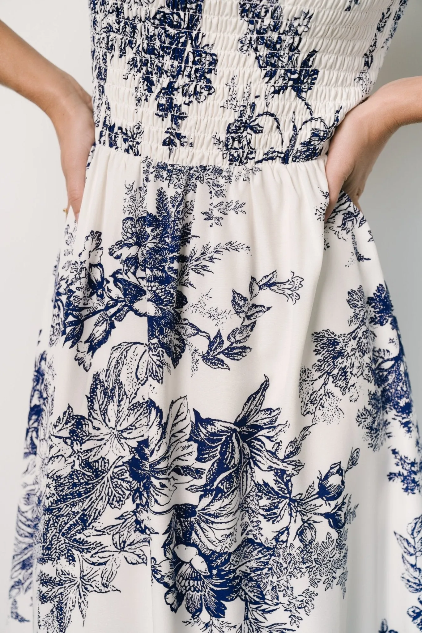 Capri Smocked Maxi Dress | Ivory + Blue Floral sold by Baltic Born product image thumbnail 2