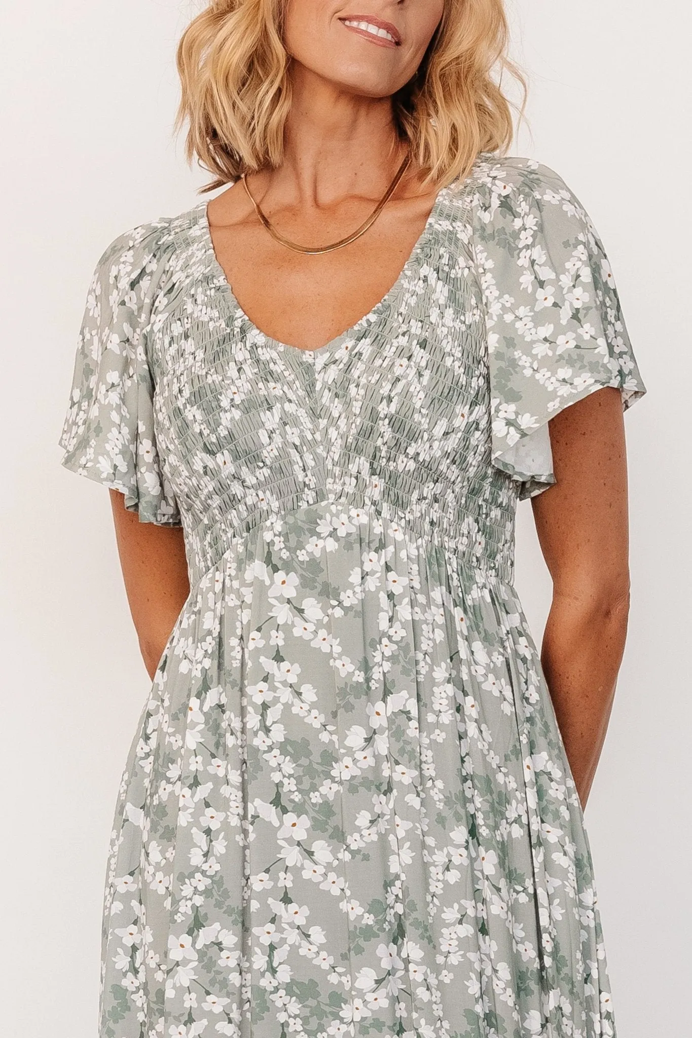 Joanie Smocked Dress | Sage + Off White Floral sold by Baltic Born product image thumbnail 2