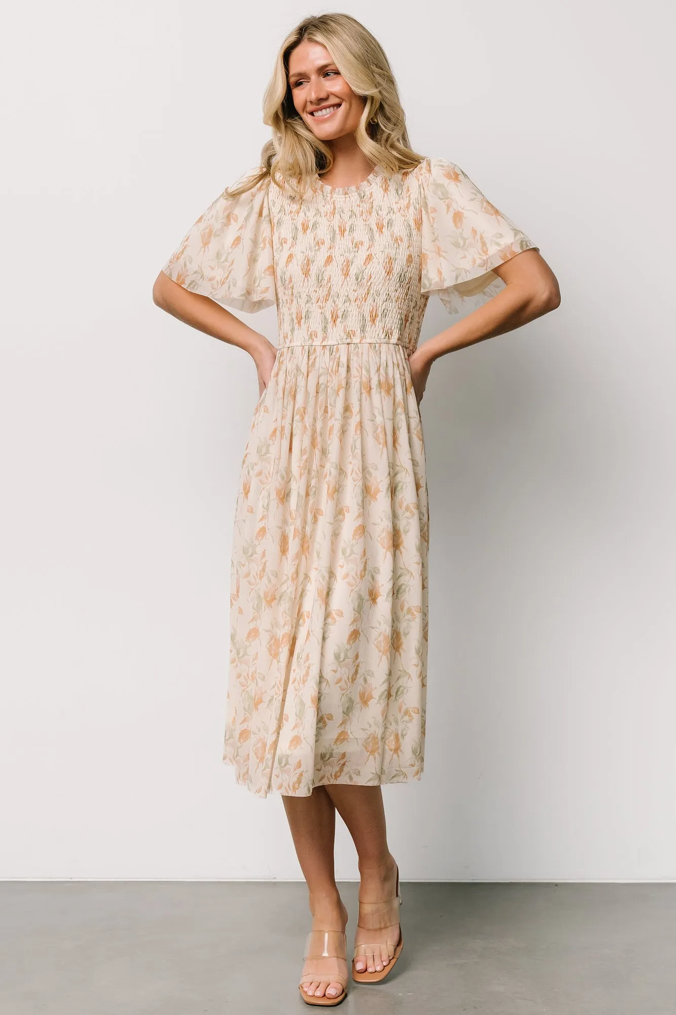 Bailey Smocked Midi Dress | Ivory + Golden Floral sold by Baltic Born