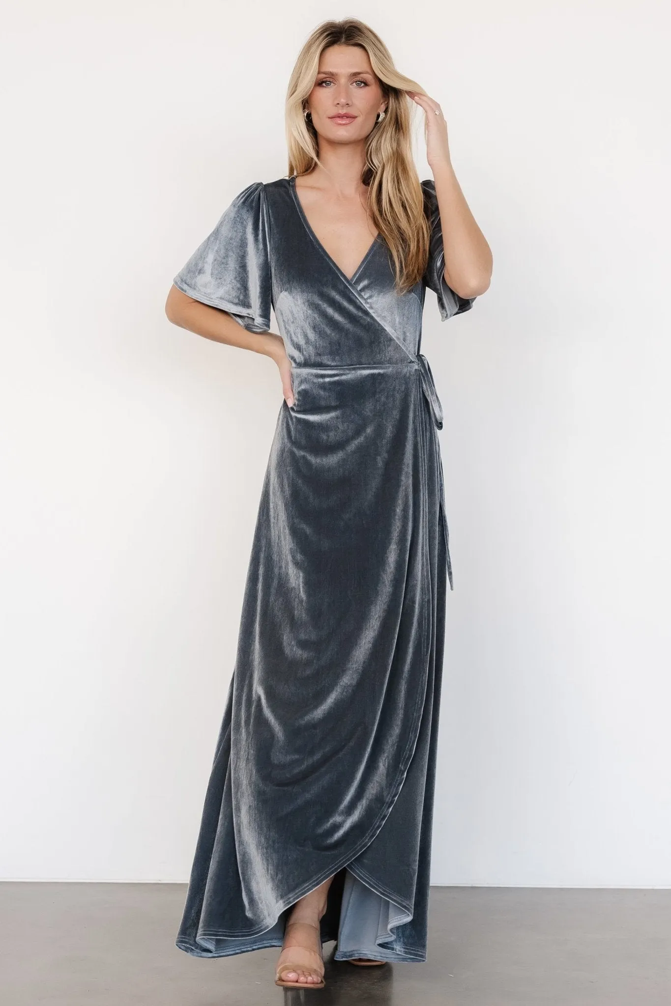 Katelyn Velvet Maxi Wrap Dress | Dusty Blue sold by Baltic Born