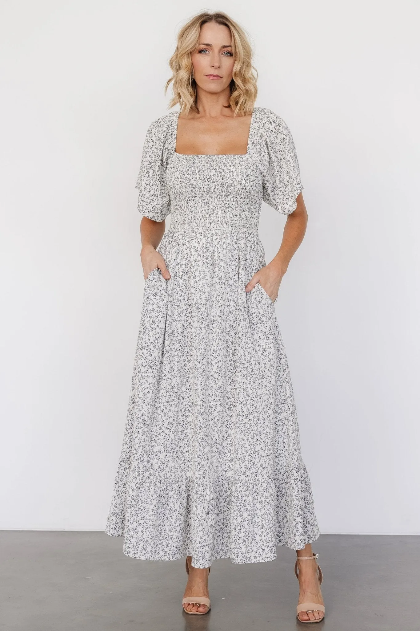 Cassis Smocked Midi Dress | Ivory + Black Floral sold by Baltic Born