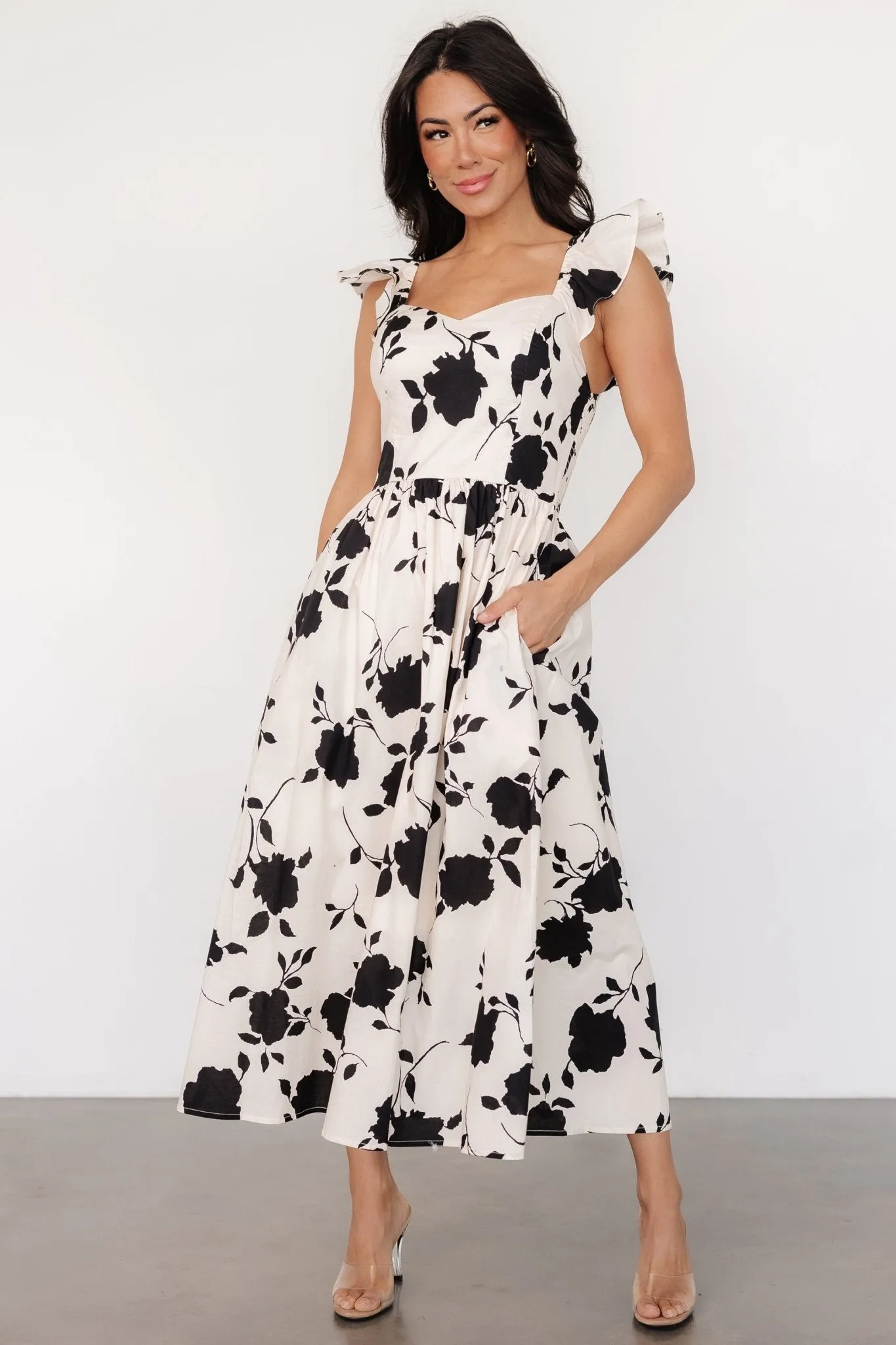 Bridget Midi Dress | Ivory + Black Floral sold by Baltic Born