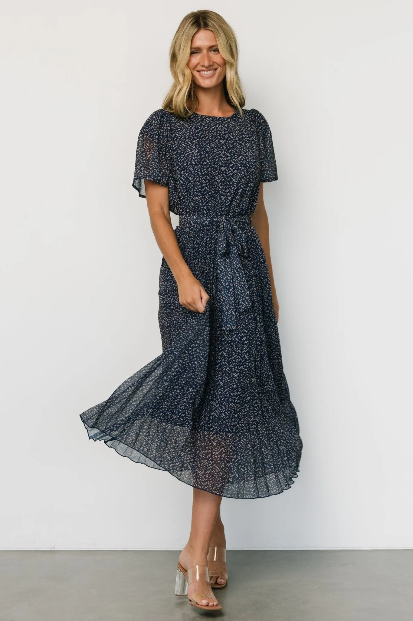 Prim Pleated Dress | Navy Print sold by Baltic Born