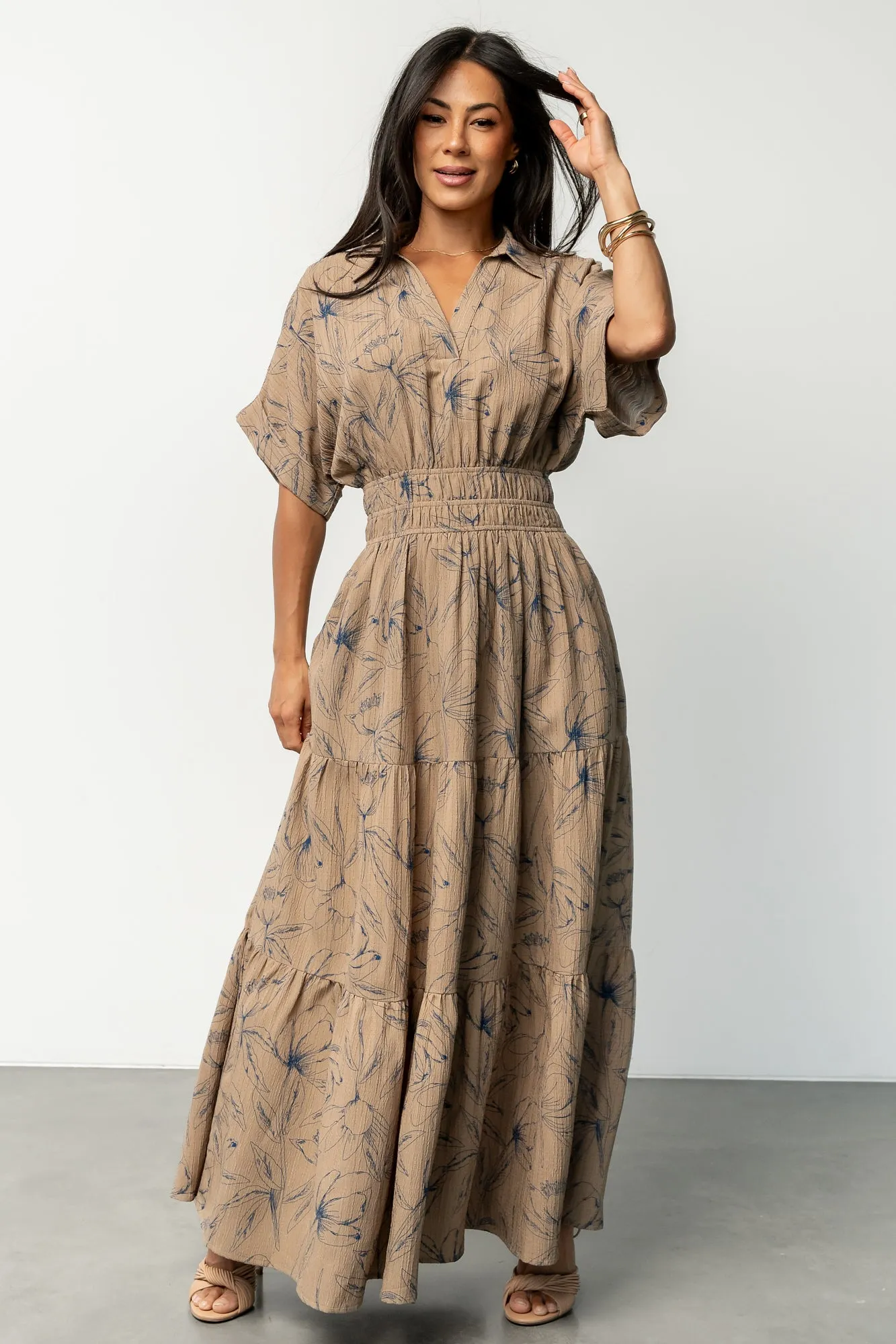 Hedda Tiered Maxi Dress | Natural + Blue Floral sold by Baltic Born