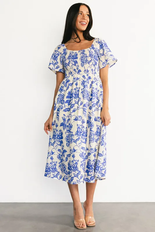 Dolores Smocked Midi Dress | Ivory + Blue Floral sold by Baltic Born