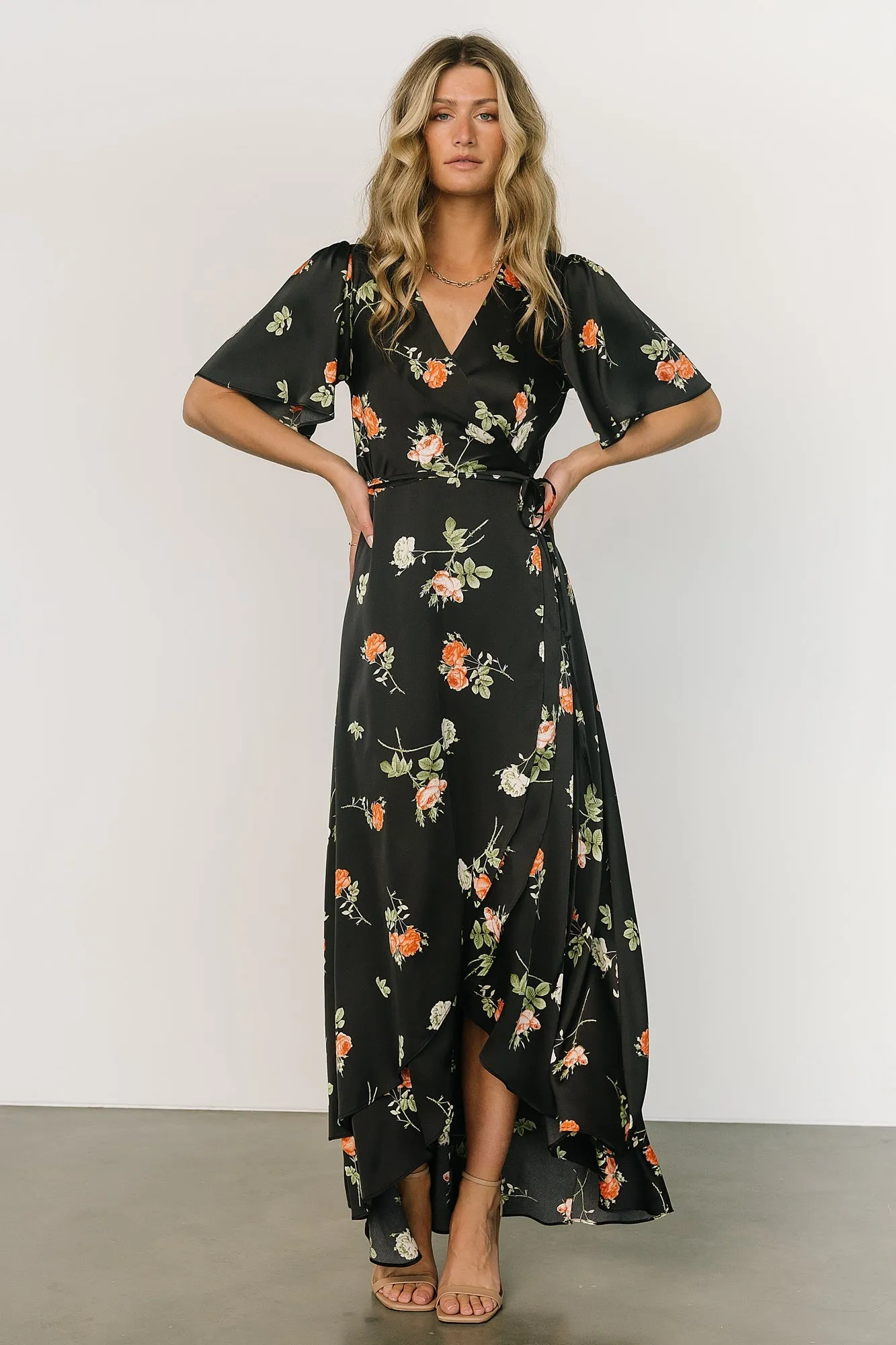 Amara Wrap Dress | Black + Coral Floral sold by Baltic Born