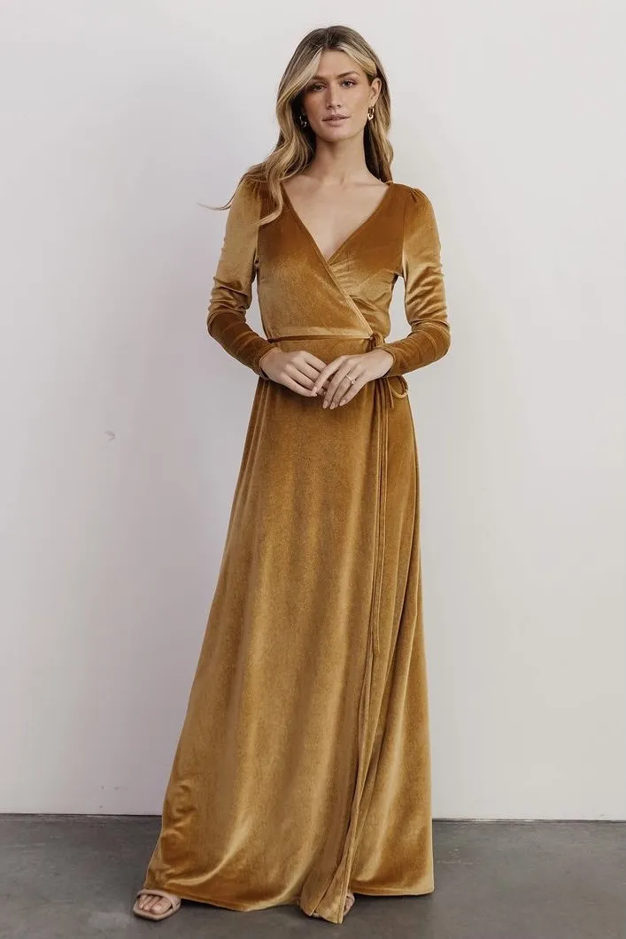 Esmerelda Velvet Wrap Maxi Dress | Gold sold by Baltic Born