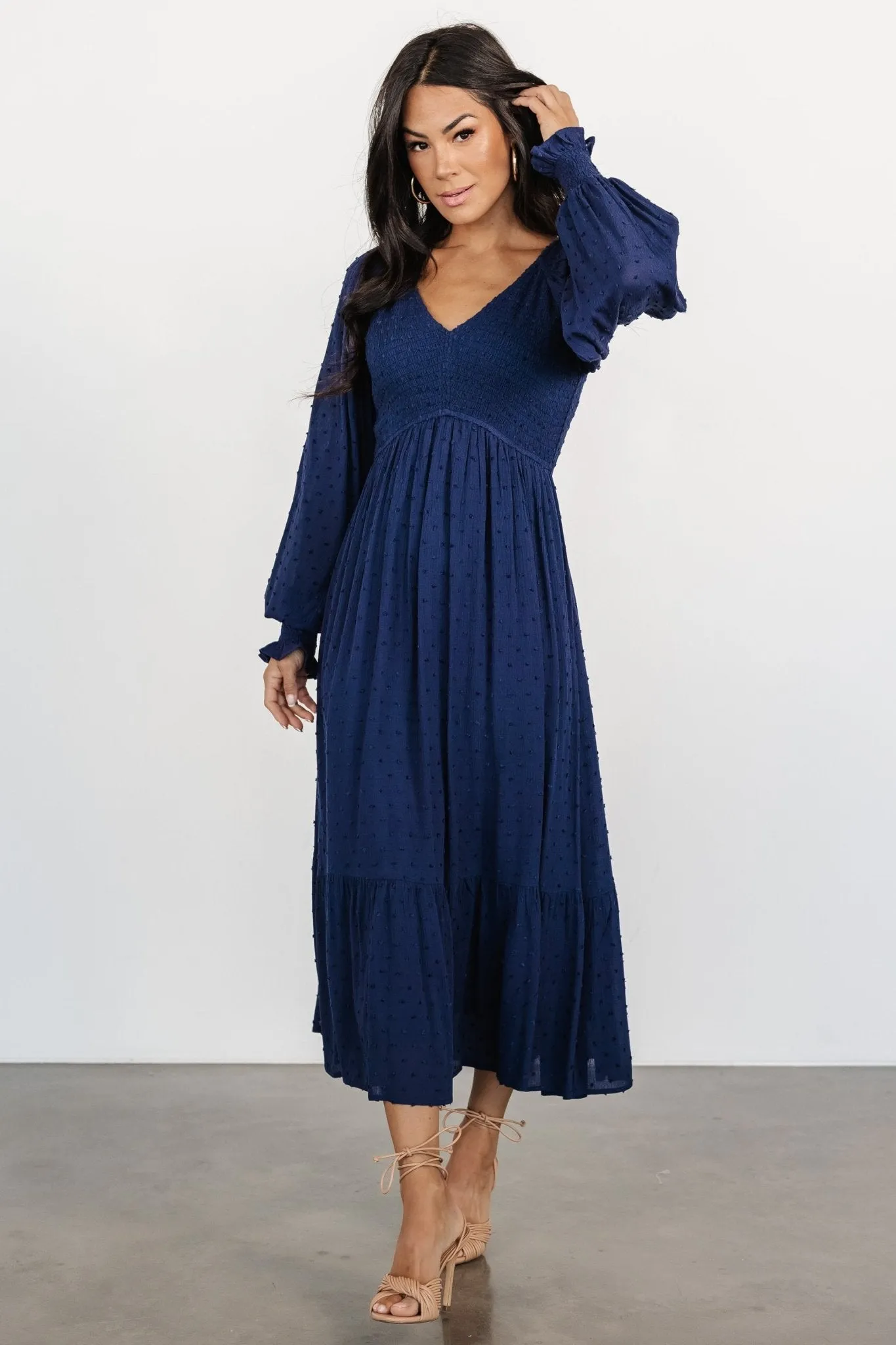 Lainey Smocked Dotted Midi Dress | Midnight Blue sold by Baltic Born